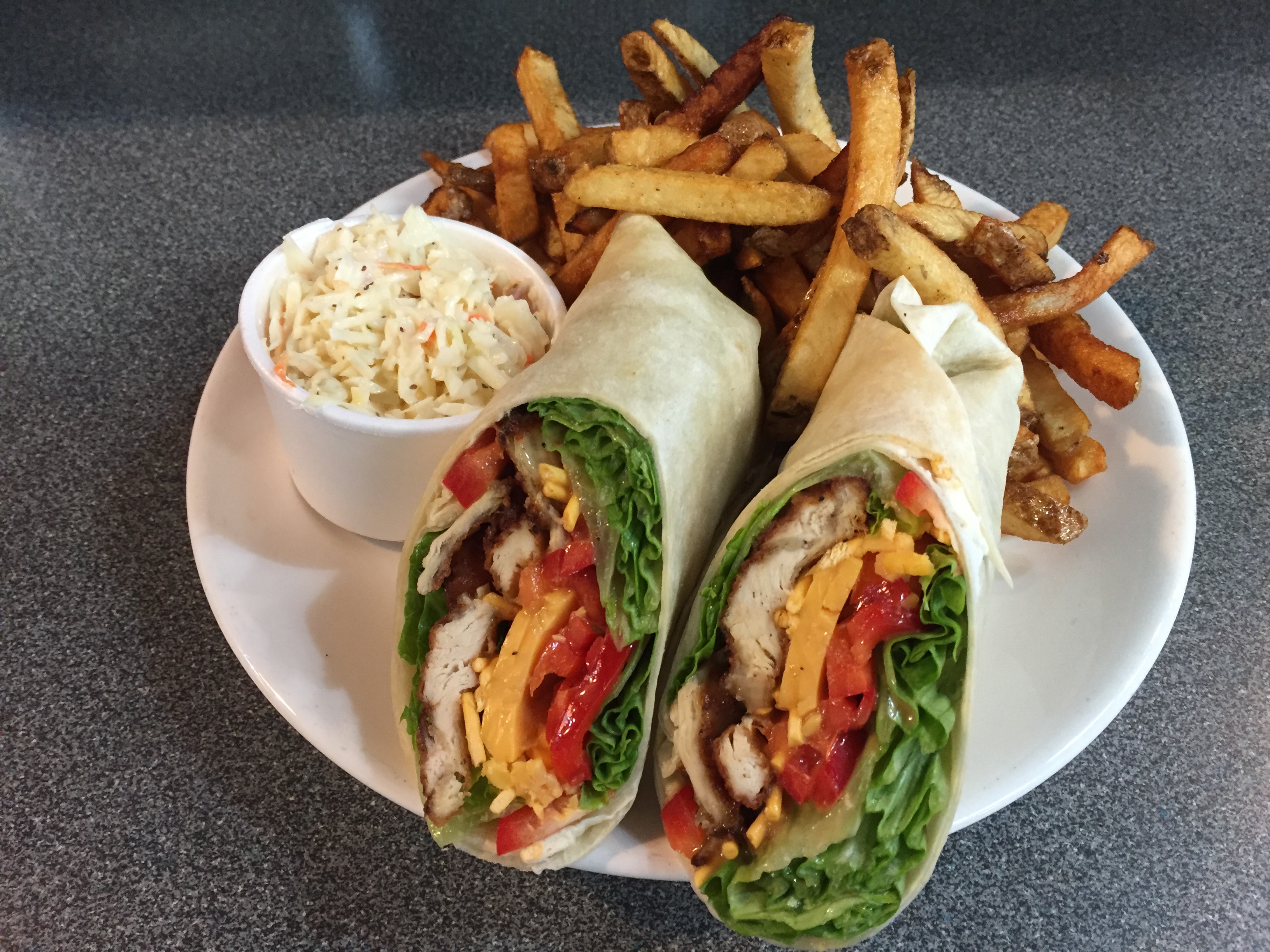 (MON) ASIAN CHICKEN CRUNCH WRAP W/FRIES/COLESLAW ORT GRAVEY /CAN OF POP OR BOTTLE WATER