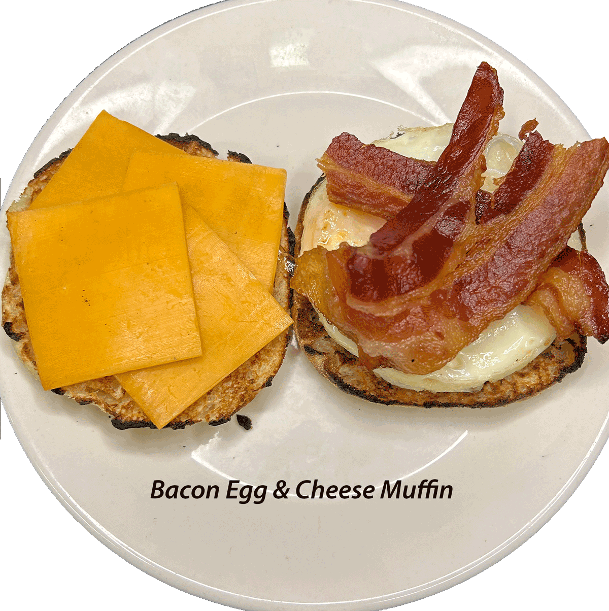 EGG & TOASTED ENGLISH MUFFIN W/CHEESE & BACON