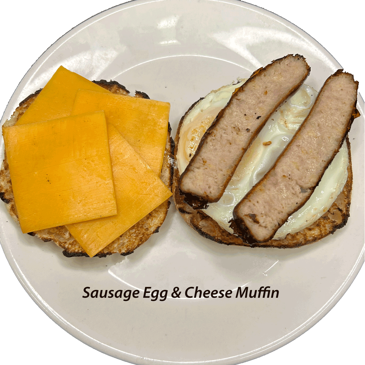 EGG & TOASTED ENGLISH MUFFIN W/CHEESE & SAUSAGE