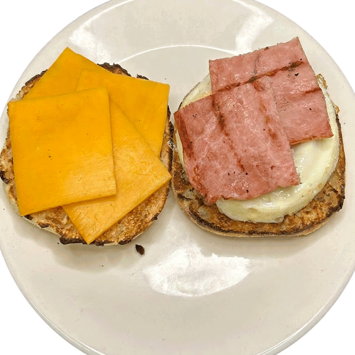 EGG & TOASTED ENGLISH MUFFIN W/CHEESE & HAM